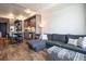 Open living room and kitchen area with hardwood floors at 1750 Wewatta St # 728, Denver, CO 80202