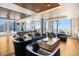 Luxurious community lounge with plush seating, pool table, and expansive city views at 1750 Wewatta St # 728, Denver, CO 80202