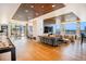 Spacious community lounge featuring hardwood floors, comfortable seating areas, and city views at 1750 Wewatta St # 728, Denver, CO 80202