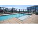 Rooftop swimming pool with city views, surrounded by a modern deck and comfortable seating at 1750 Wewatta St # 728, Denver, CO 80202