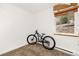 Small room with a bike parked next to a window at 100 Now Colorado Ct # D1, Breckenridge, CO 80424