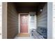 Inviting entryway with bench, front door and charming details at 7432 S Quail Cir # 1818, Littleton, CO 80127
