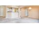 Bright living area with chandelier open to kitchen with breakfast bar at 7432 S Quail Cir # 1818, Littleton, CO 80127