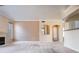 View of the open living area with neutral colors and ample natural light at 7432 S Quail Cir # 1818, Littleton, CO 80127