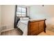 Cozy bedroom with neutral walls and carpet at 7440 S Blackhawk St # 4-104, Englewood, CO 80112