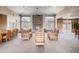 Spacious community room featuring a fireplace, comfortable seating, and dining areas at 7440 S Blackhawk St # 4-104, Englewood, CO 80112