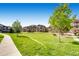 Landscaped community featuring well-maintained lawns and attractive buildings at 7440 S Blackhawk St # 4-104, Englewood, CO 80112