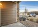 View of the detached garage highlighting the parking area and complex design at 7440 S Blackhawk St # 4-104, Englewood, CO 80112
