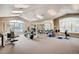 Well-equipped fitness center with modern exercise machines and natural light at 7440 S Blackhawk St # 4-104, Englewood, CO 80112