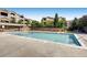Inviting community pool with ample seating and well-maintained landscaping, perfect for relaxation and recreation at 7440 S Blackhawk St # 4-104, Englewood, CO 80112