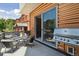 Balcony offering an outdoor seating area and a stainless steel gas grill at 1711 Boulder St, Denver, CO 80211