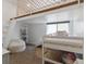 This bright bedroom features a loft, a ladder, and a bunk bed at 1711 Boulder St, Denver, CO 80211