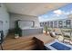 Relaxing hot tub area with comfortable seating and a modern fire pit on the rooftop deck at 1711 Boulder St, Denver, CO 80211