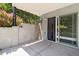 Covered patio with a concrete floor, modern design elements, and access to the interior at 1711 Boulder St, Denver, CO 80211