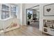 This charming playroom features hardwood floors, a play kitchen, and plenty of space to play at 1711 Boulder St, Denver, CO 80211