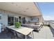 Spacious rooftop deck features a hot tub, outdoor seating, and city views at 1711 Boulder St, Denver, CO 80211