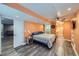 Basement bedroom with recessed lighting, adjacent bathroom and kitchen areas at 1824 Morningview Ln, Castle Rock, CO 80109