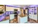 Well-lit kitchen featuring granite countertops, stainless steel appliances, and custom backsplash at 1824 Morningview Ln, Castle Rock, CO 80109