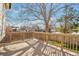 Inviting backyard deck surrounded by mature trees and neighborhood views, perfect for relaxing and entertaining outdoors at 10956 Osprey Ct, Parker, CO 80134