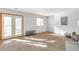 Cozy living room with a glass door and window providing lots of natural light at 10956 Osprey Ct, Parker, CO 80134