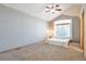 This main bedroom has carpet flooring, brick accent wall and vaulted ceilings at 10956 Osprey Ct, Parker, CO 80134