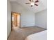 A bright main bedroom featuring neutral paint, carpet flooring and large closet at 10956 Osprey Ct, Parker, CO 80134