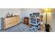 Home office setup with desk, computer, and storage, ideal for remote work at 13742 W 67Th Pl, Arvada, CO 80004