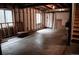Unfinished basement with exposed ceilings and ample natural light provides a blank canvas for customization at 11384 Oakland Dr, Commerce City, CO 80640