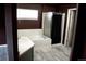 Bathroom featuring a soaking tub, modern vanity, and a separate shower provides a luxurious retreat at 11384 Oakland Dr, Commerce City, CO 80640