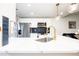 Modern kitchen featuring stainless steel appliances, white cabinets, and a gold faucet at 1543 S Ouray Cir # B, Aurora, CO 80017