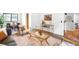 Stylish living room with hardwood floors, a comfortable seating area, and an open layout, perfect for entertaining guests at 7603 W Coal Mine Pl, Littleton, CO 80128