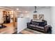 Finished basement features a projector and screen for entertainment, plus a wet bar at 4889 S Elkhart Ct, Aurora, CO 80015