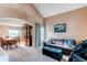 Comfortable living area with dining space showcasing a classic hutch at 4889 S Elkhart Ct, Aurora, CO 80015