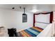Basement theater room with screen, projector and access to outside at 4889 S Elkhart Ct, Aurora, CO 80015