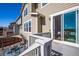 Back deck with a dining table and chairs, steps to the backyard, and views of the mountains at 10554 Casper Pt, Parker, CO 80134