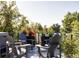 Relaxing rooftop deck with hot tub, seating area, and city views at 1286 S Pennsylvania St, Denver, CO 80210