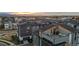 Townhome community with rooftop decks offering outdoor living and stunning views at 6776 Navajo Way, Denver, CO 80221