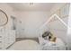 Charming bedroom featuring a unique white house bed, modern decor, and a cozy, inviting atmosphere at 6776 Navajo Way, Denver, CO 80221