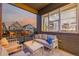 Outdoor patio featuring comfortable seating, stylish decor, and neighborhood views at 6776 Navajo Way, Denver, CO 80221