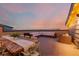 Relax on this rooftop deck with beautiful city views and a dining and lounging area at 6776 Navajo Way, Denver, CO 80221