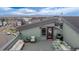 Stylish rooftop deck featuring dining and lounge areas, great for entertaining with mountain views at 6776 Navajo Way, Denver, CO 80221