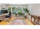 Office space filled with natural light, a modern desk, and a hardwood floor at 901 S Leyden St, Denver, CO 80224