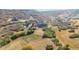 Sprawling estate with mature landscaping offering privacy and serenity on acreage with mature trees at 1967 Haystack Rd, Castle Rock, CO 80104