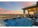 Exterior shot of a hot tub on a back deck overlooking a scenic view at 1967 Haystack Rd, Castle Rock, CO 80104