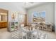 Bright playroom features a round table with chairs, a window seat, shelving, and natural light at 1967 Haystack Rd, Castle Rock, CO 80104