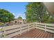 A view from the private balcony overlooking the well-maintained grounds and lush trees at 10251 W 44Th Ave # 3-204, Wheat Ridge, CO 80033