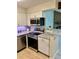 Updated kitchen with stainless steel appliances and granite countertops provides a modern cooking space at 10251 W 44Th Ave # 3-204, Wheat Ridge, CO 80033