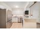 Open kitchen features stainless steel appliances, granite countertops and ample cabinet space at 10251 W 44Th Ave # 3-204, Wheat Ridge, CO 80033