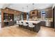 Spacious kitchen with a large island, modern appliances, and stylish pendant lighting at 1100 S Elizabeth St, Denver, CO 80210