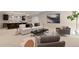 Open-concept living room with stylish furnishings and natural light at 1100 S Elizabeth St, Denver, CO 80210